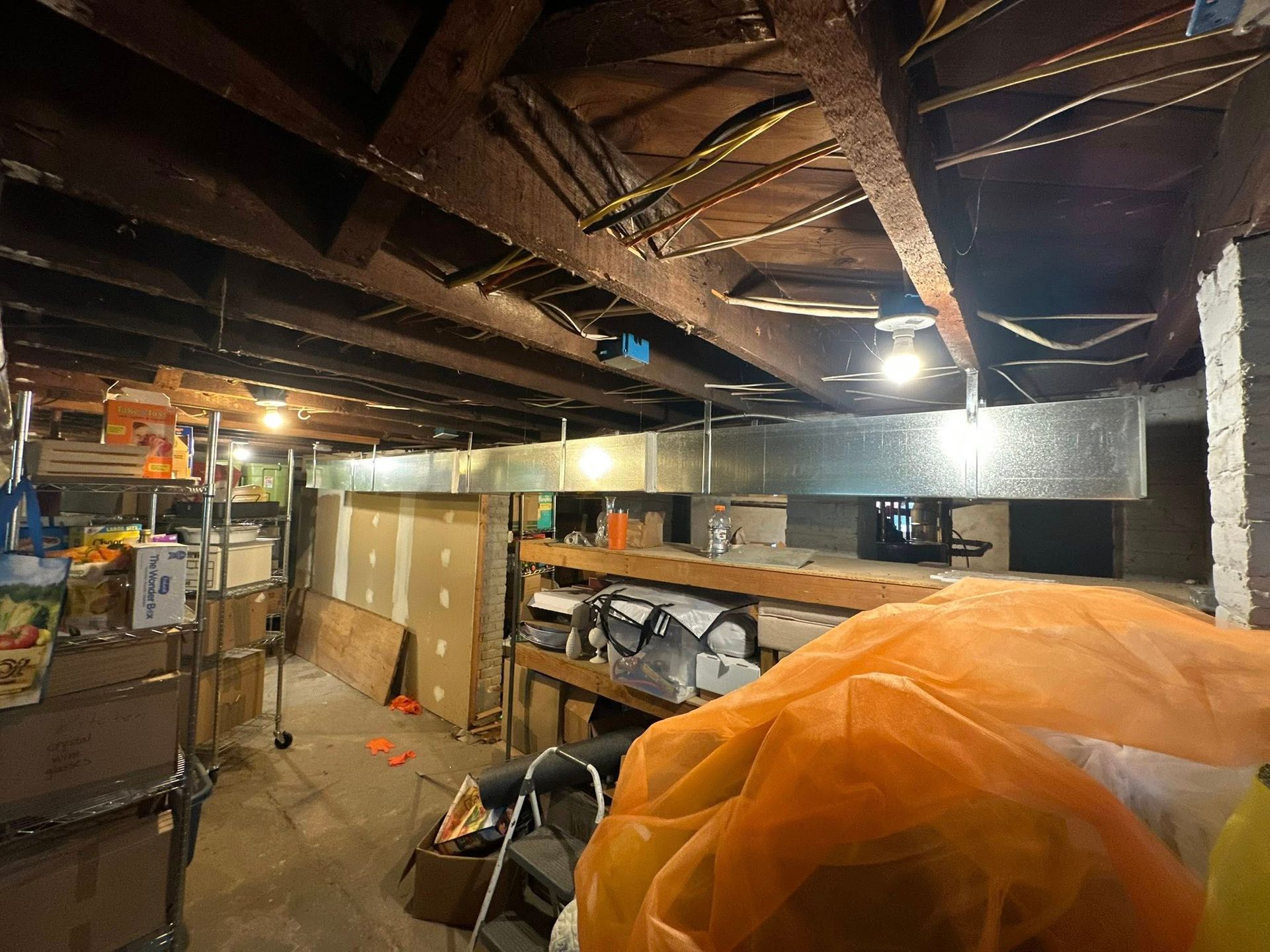 A wooden fence with a gate attached to it.