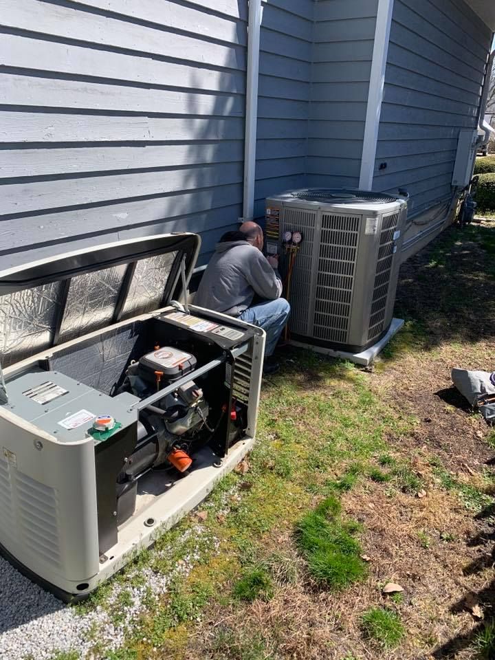 A wooden fence is sitting in the middle of a grassy field.