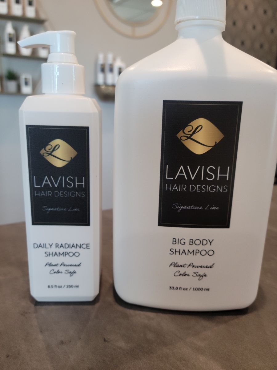 Before and after photos of a hair transformation with blonde to dark blue, green, and red highlights.