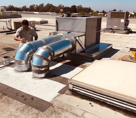 Technician Working On A Capacitor Part — Huntington Beach, CA — Amm Air Conditioning & Heating