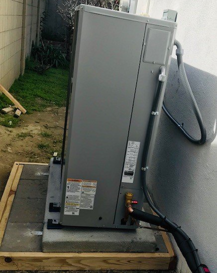 Electrician Checking Air Conditioning Unit — Huntington Beach, CA — Amm Air Conditioning & Heating