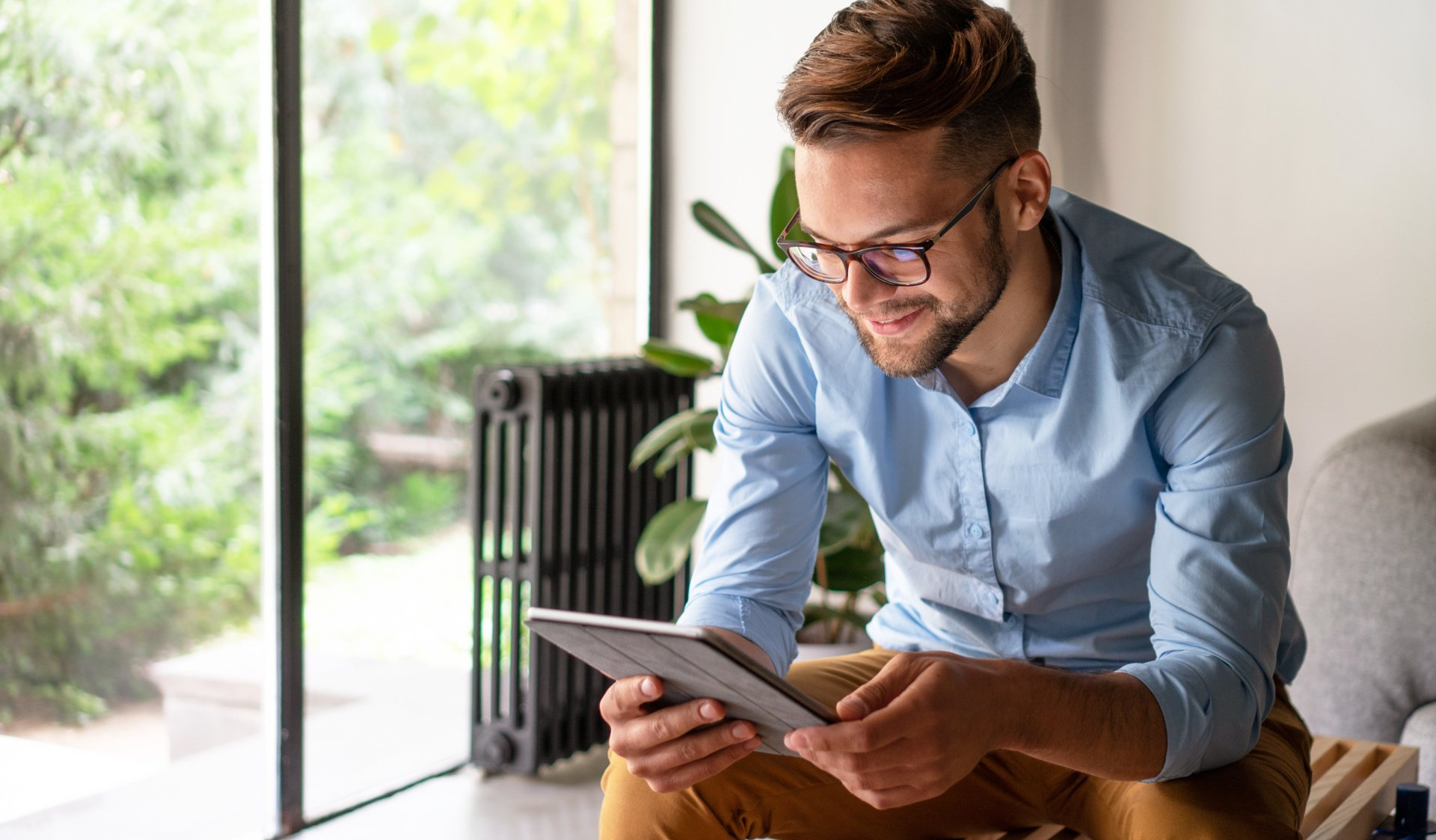 Man Applying on Ipad