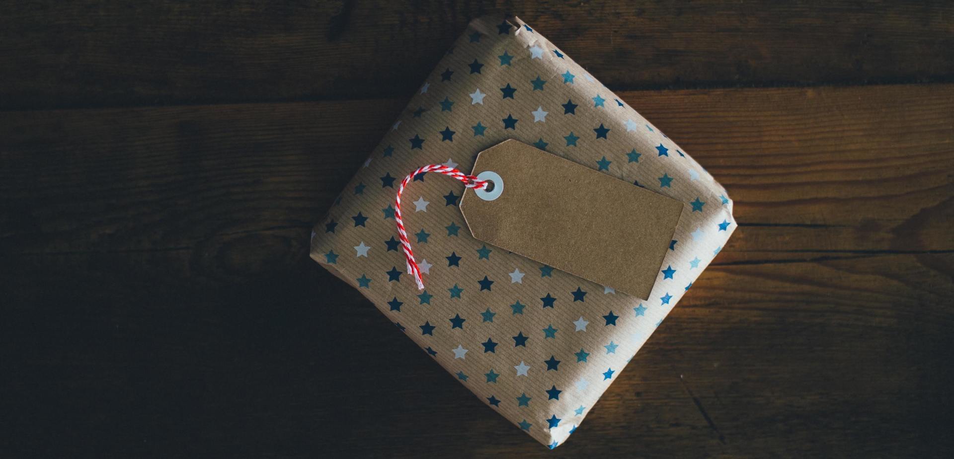 creating a grief care package wrapped present with tag