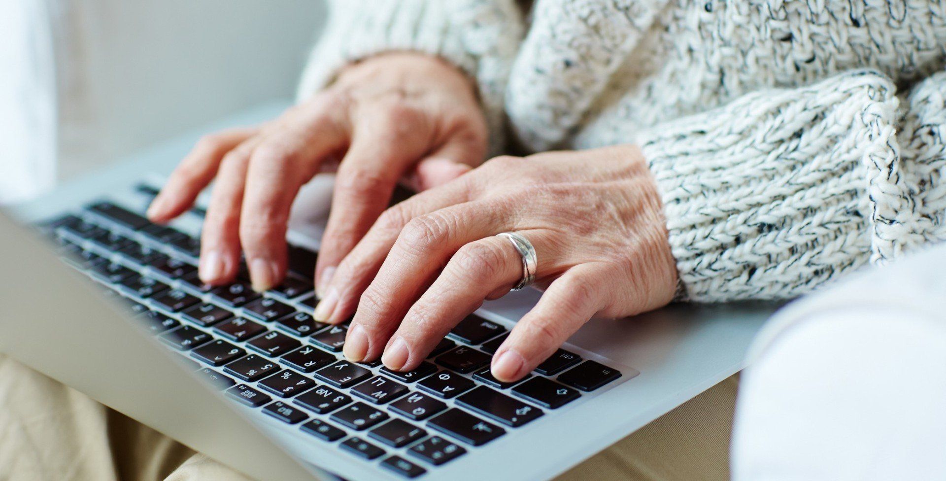 funeral-pre-planning-senior-typing-on-computer