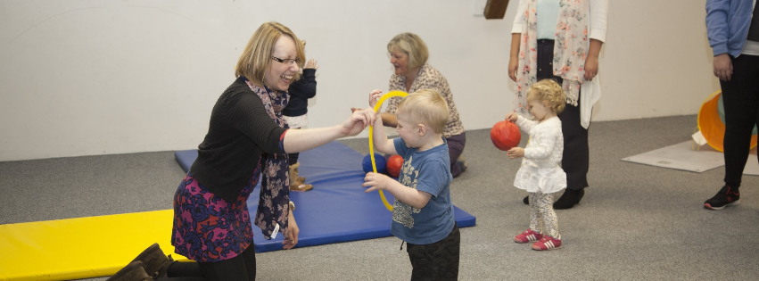 parents and children playing together.