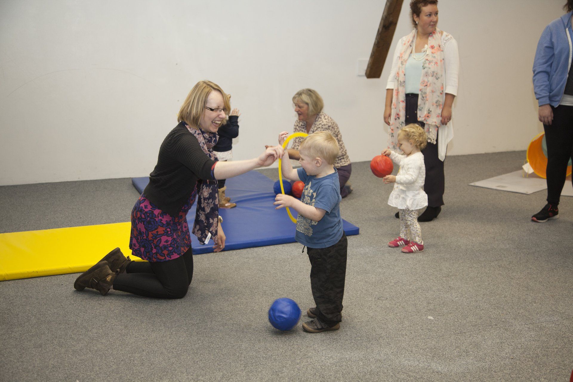Children and parents playing