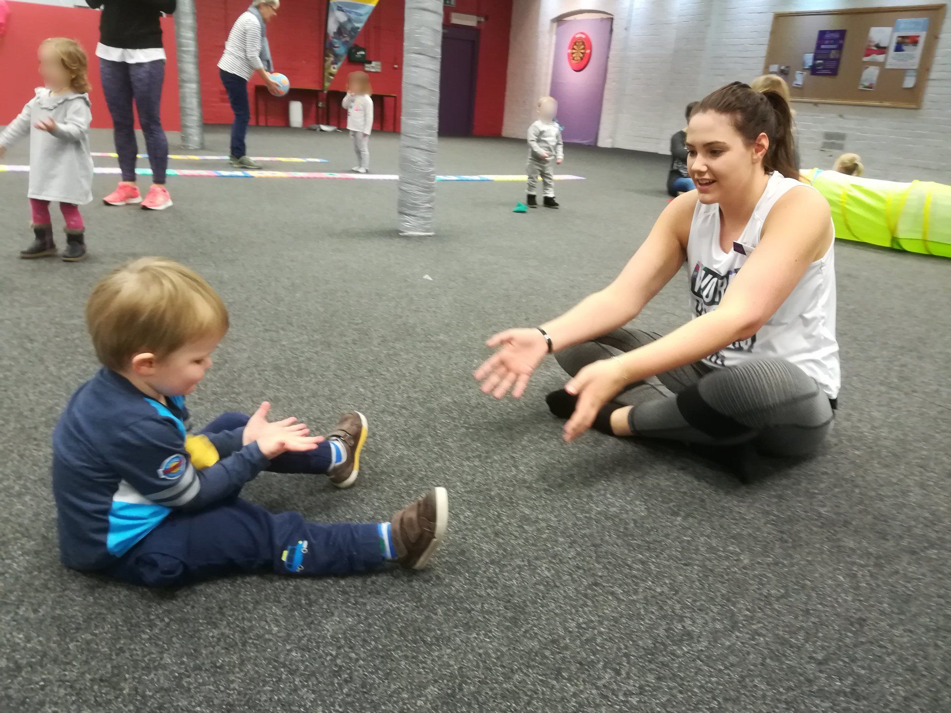 A child and a women playing together