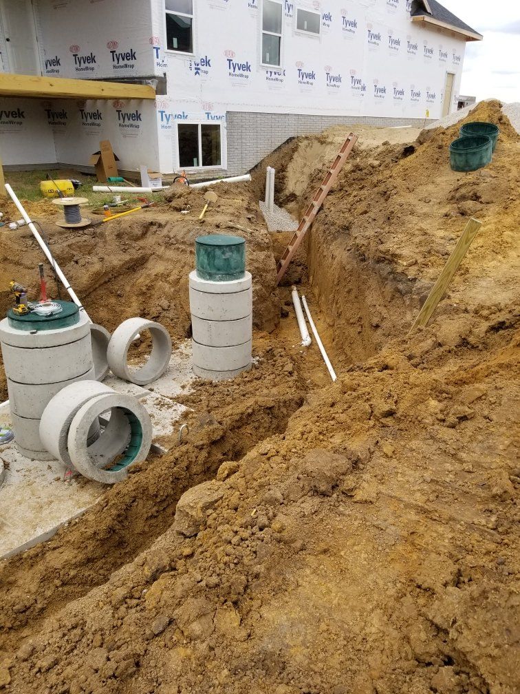 Installation of Grinder Pump Holding Tank — Cedar Rapids Metro Area — McBurney Septic Service