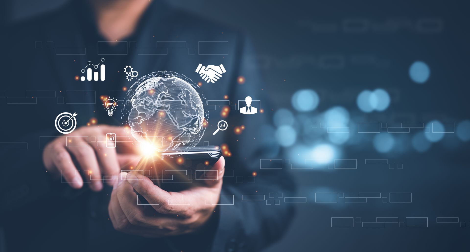 A man is holding a smart phone with a globe coming out of it.