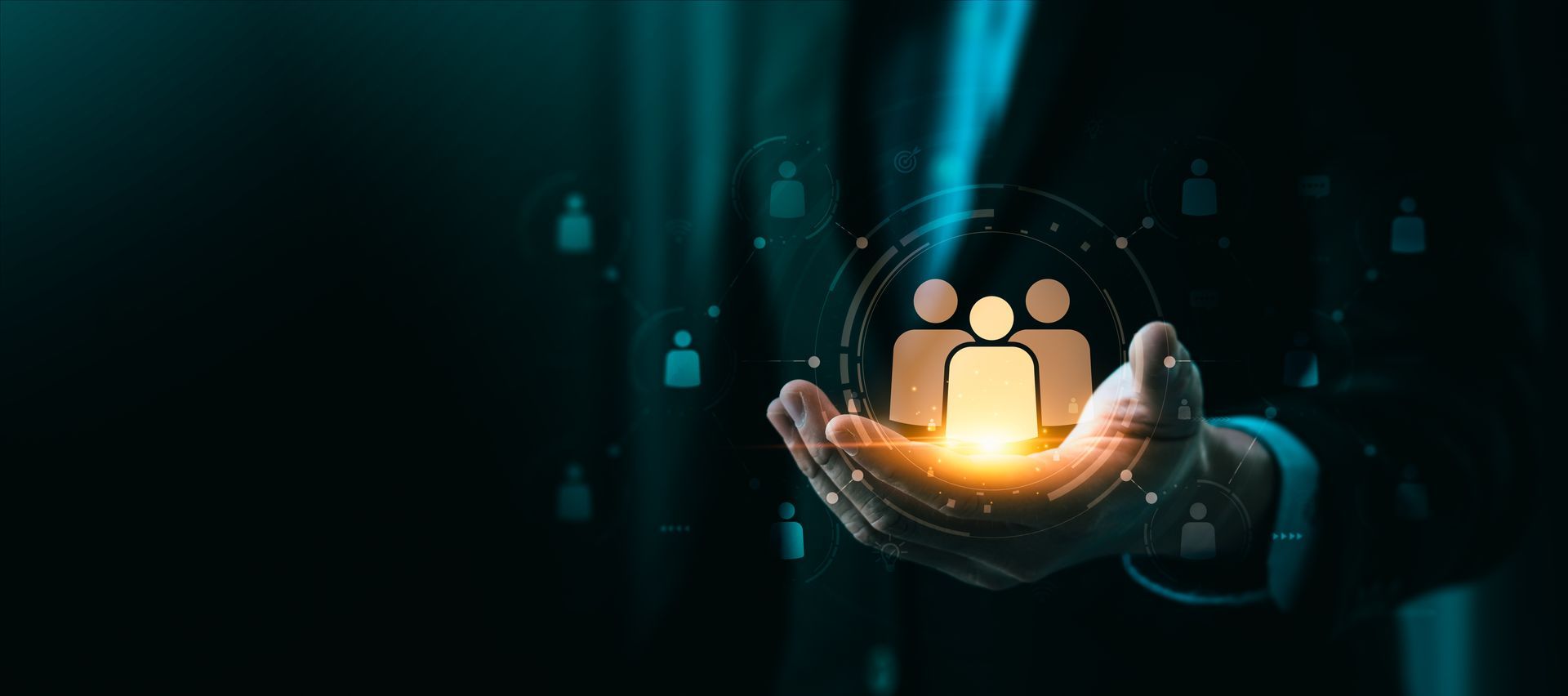 A person is holding a group of people in their hands.