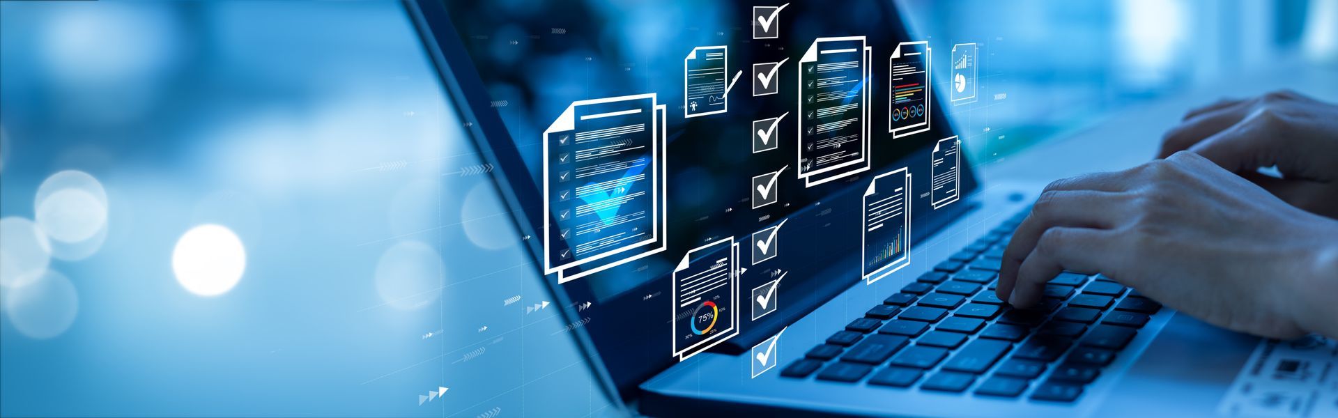 A person is typing on a laptop computer.