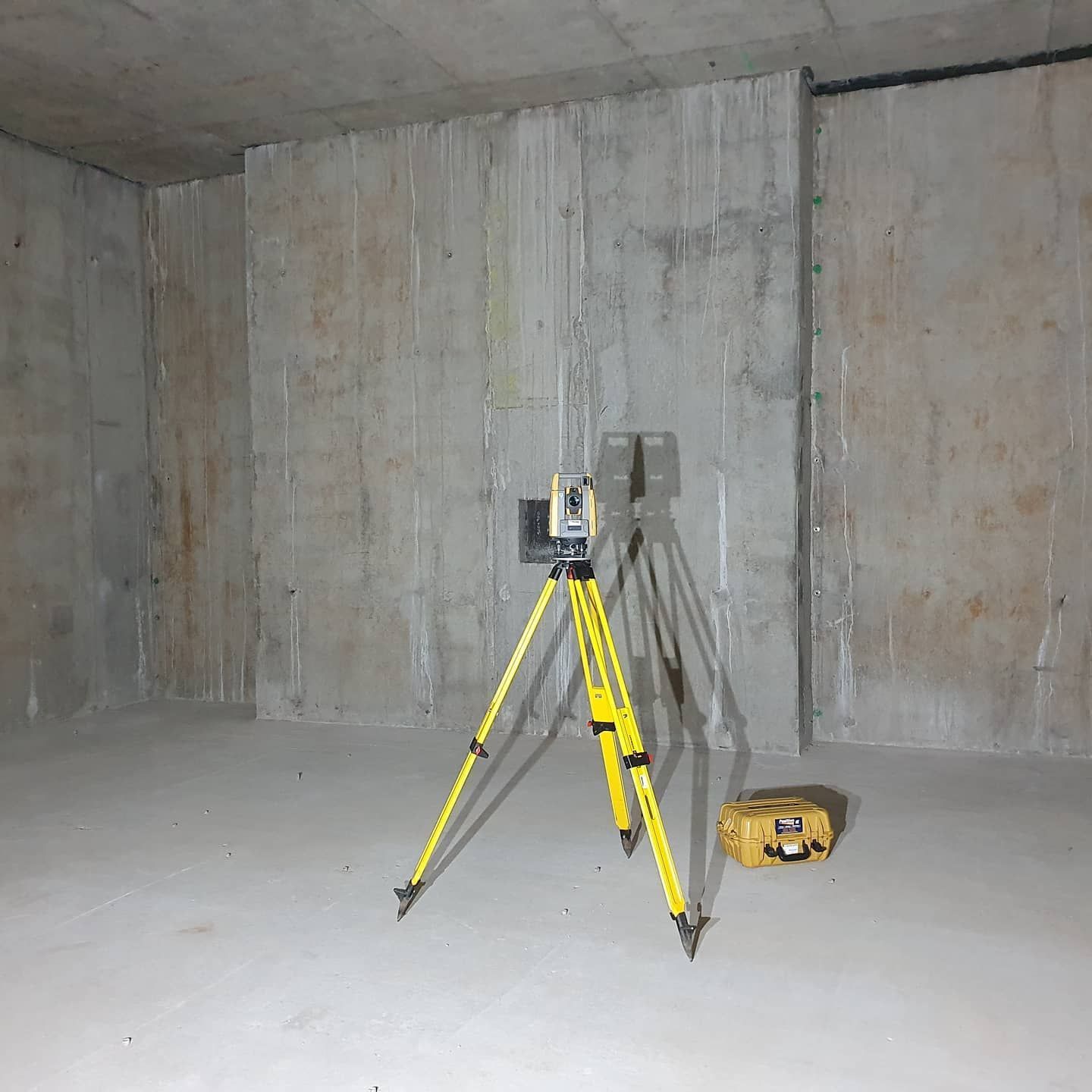 A Yellow Tripod With A Camera On It In An Empty Room — Western Survey Pty Ltd In Cowra, NSW