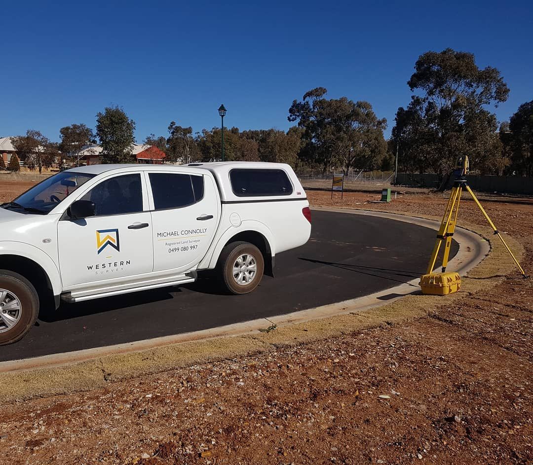A White Truck Is Parked On The Side Of A Road — Western Survey Pty Ltd In Orange, NSW
