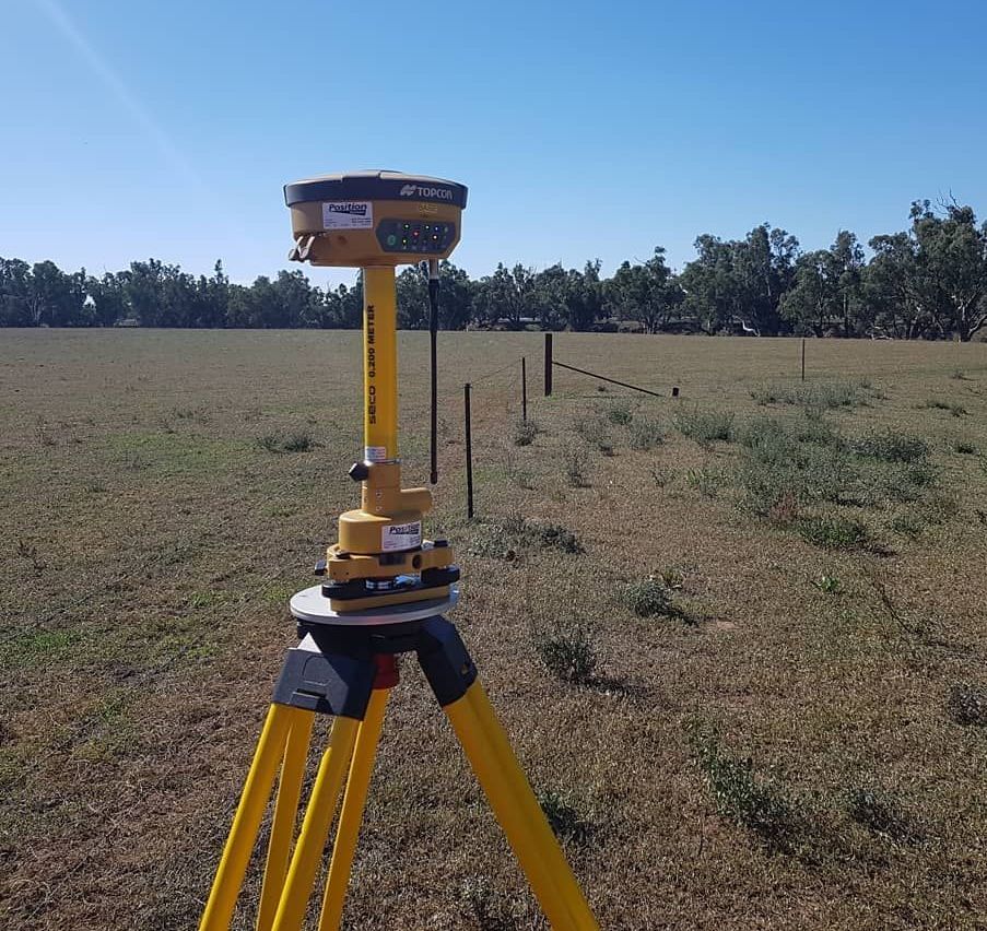 A Yellow Tripod With A Gps Device On Top Of It — Western Survey Pty Ltd In Dubbo, NSW