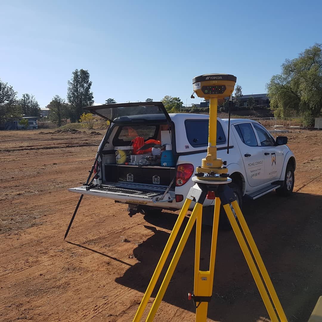 A White Truck With A Yellow Tripod In Front Of It — Western Survey Pty Ltd In Dubbo, NSW