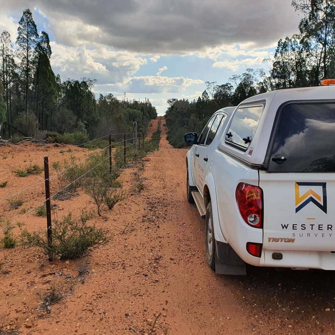A White Truck Is Parked On The Side Of A Dirt Road — Western Survey Pty Ltd In Coonamble, NSW