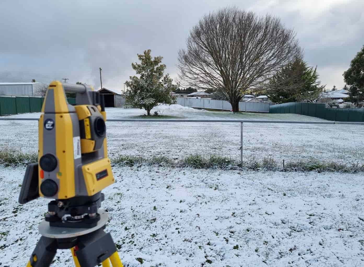 A Yellow And Grey Device Is Sitting In The Snow — Western Survey Pty Ltd In Orange, NSW