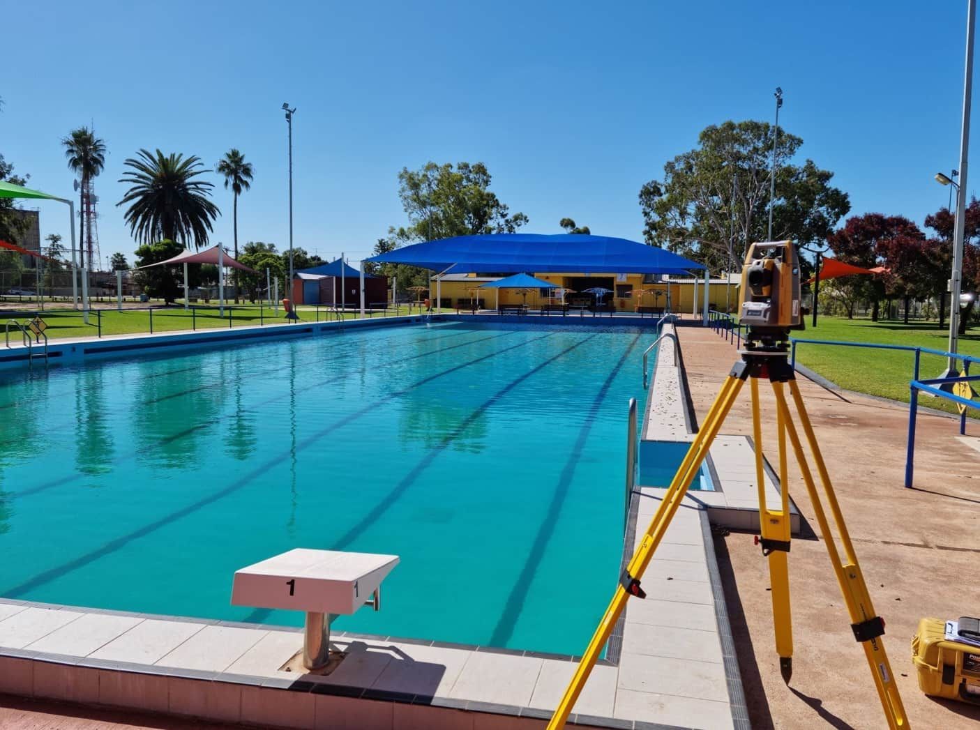 A Swimming Pool With A Tripod In Front Of It — Western Survey Pty Ltd In Parkes, NSW