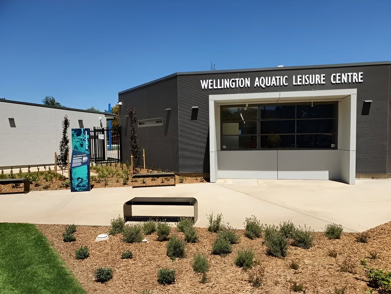 A Large Building With A Sign That Says Wellington Aquatic Leisure Centre — Western Survey Pty Ltd In Dubbo, NSW