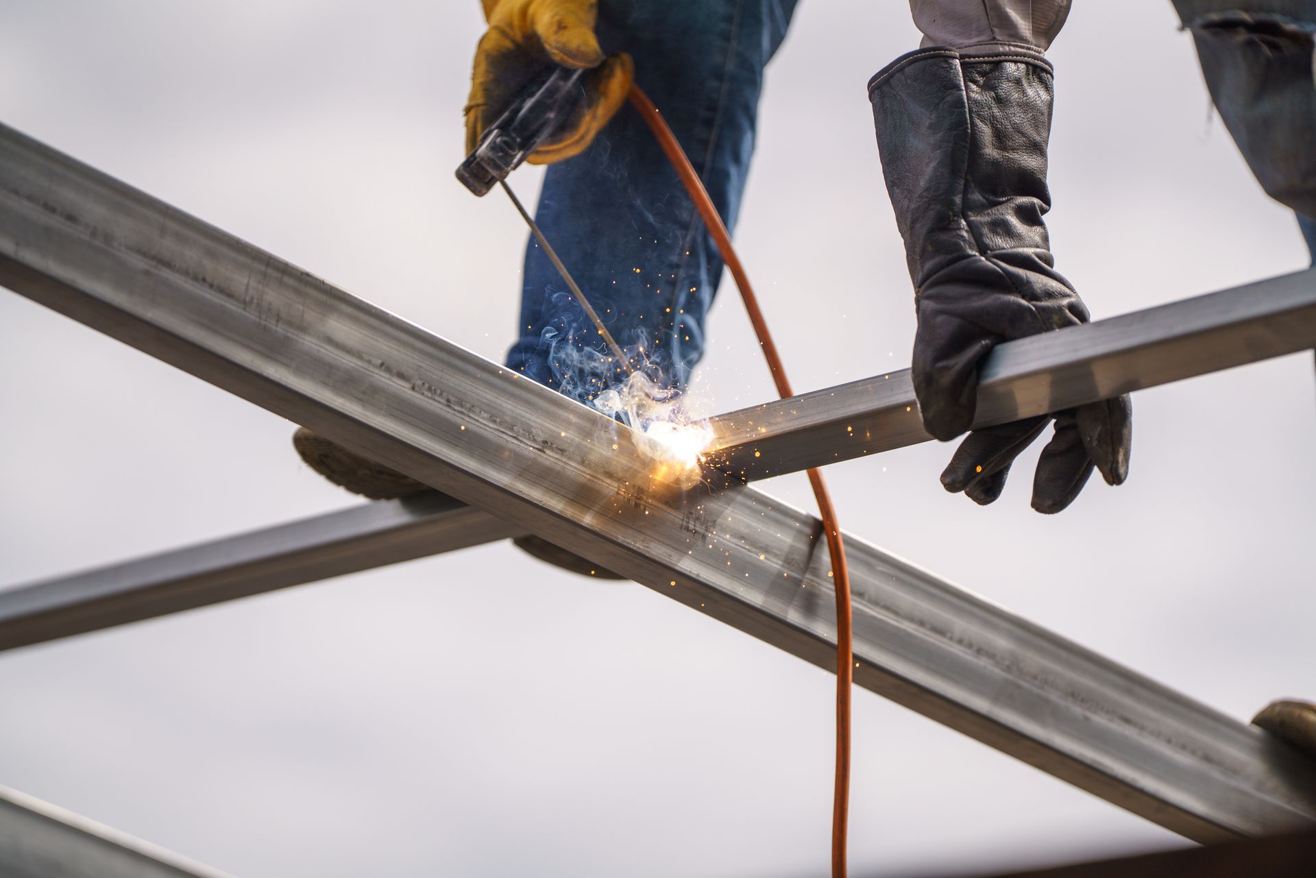 A metal beam bracing installation in a building’s foundation.