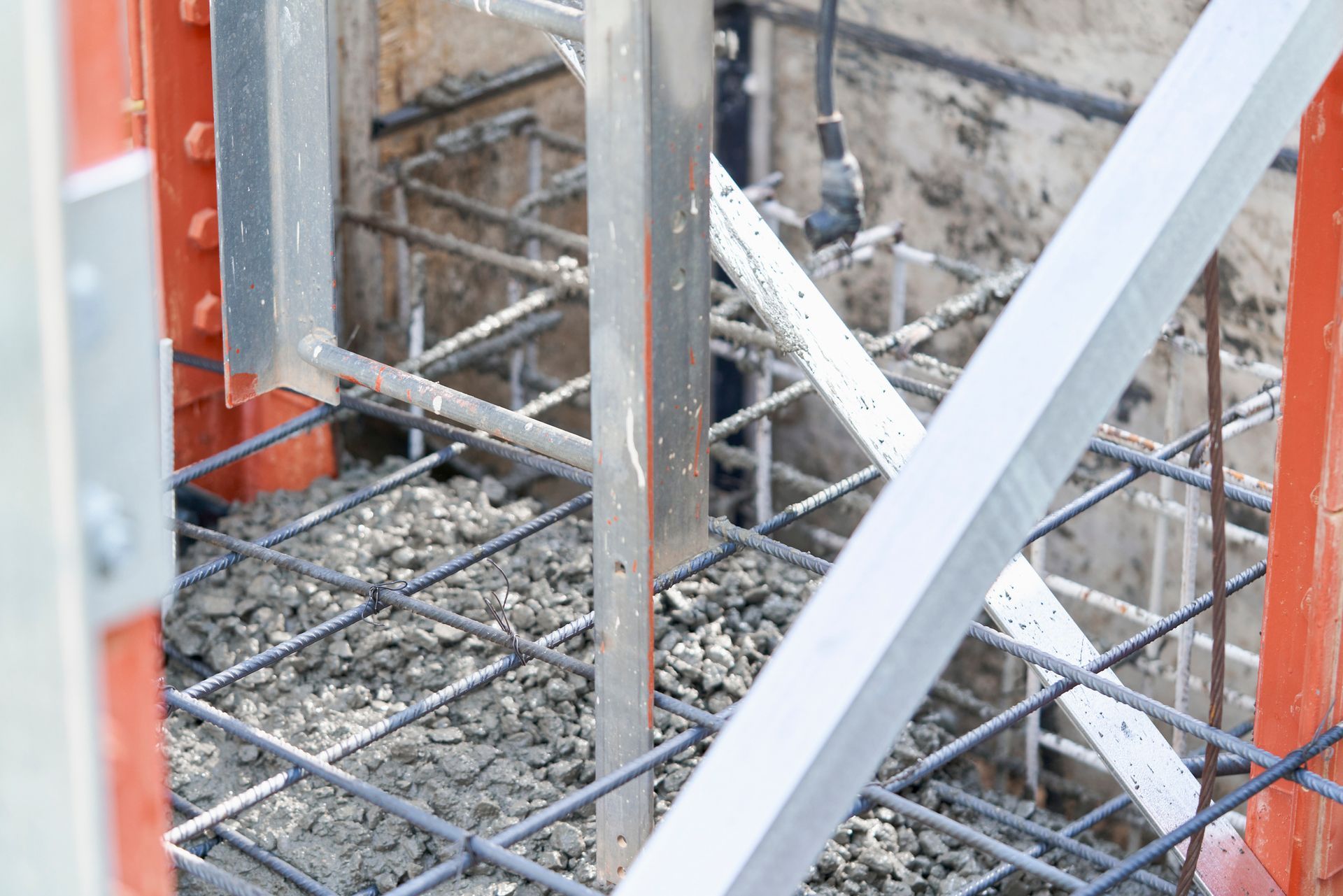Foundation Metal Beam Bracing with reinforced concrete and steel supports at building site. Foundation Metal Beam Bracing with reinforced concrete and steel supports at building site.
