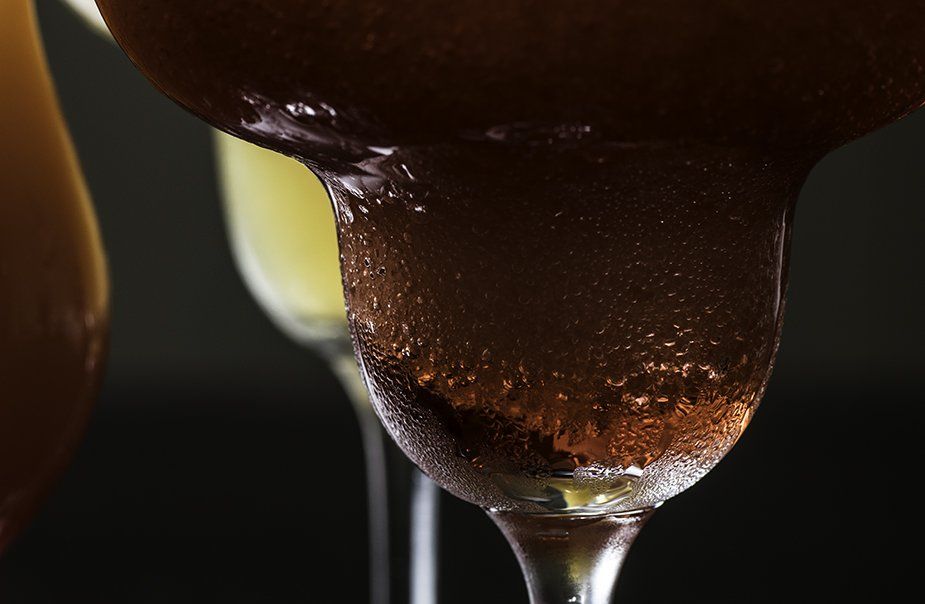 A close up of a drink in a martini glass