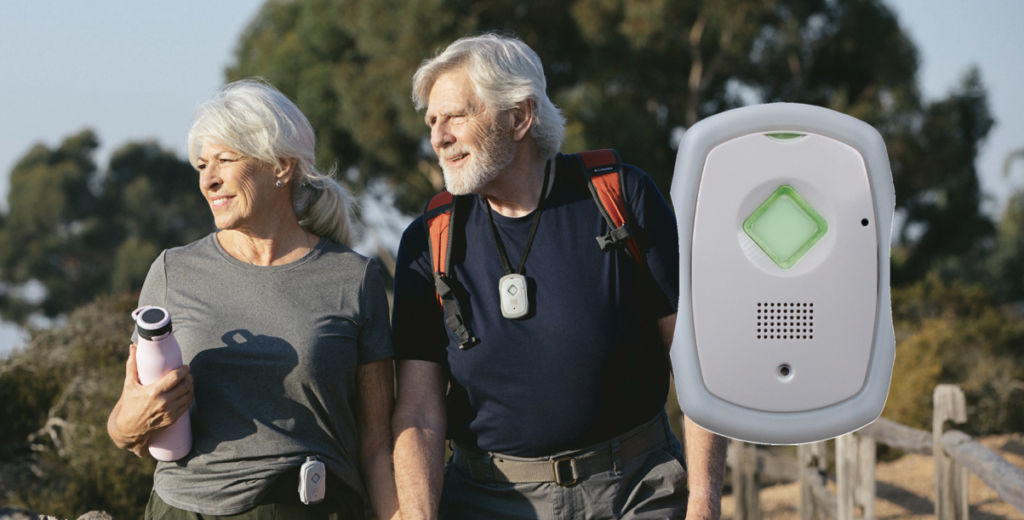 A man and a woman are walking down a path next to a cell phone.