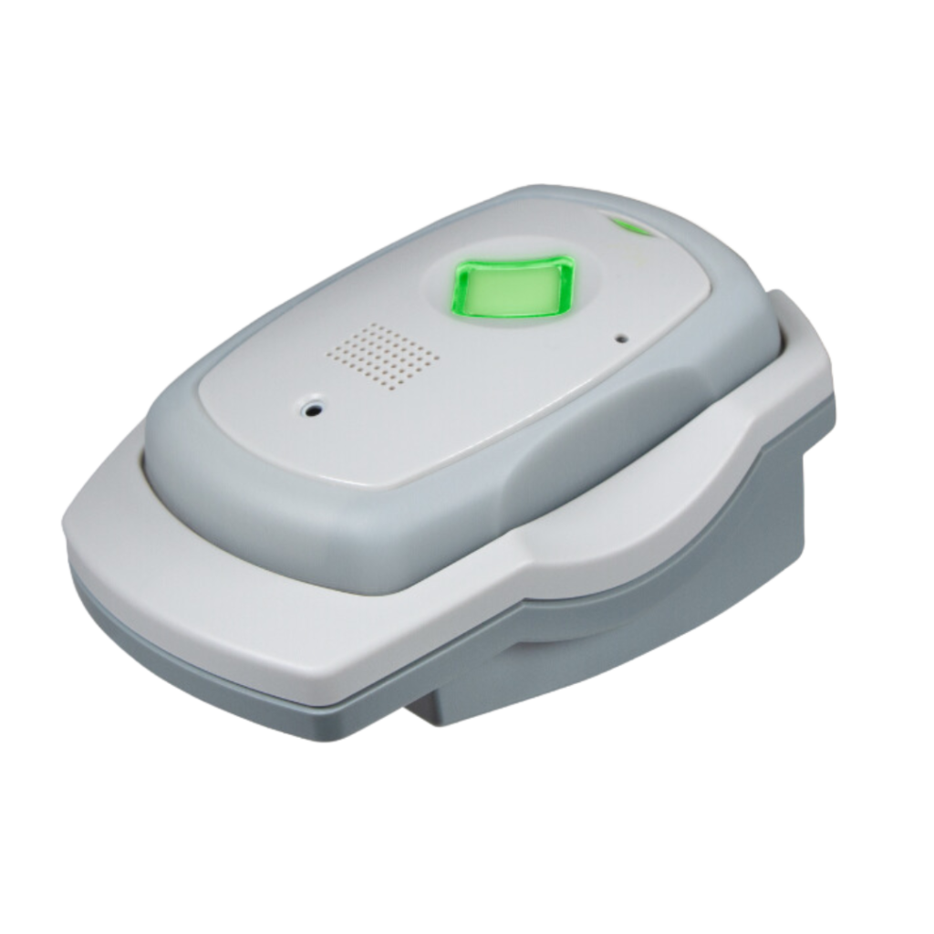 A gray and white device with a green button on it