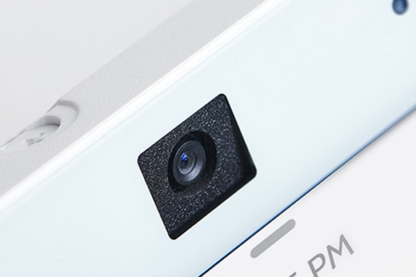 A close up of a camera on the back of a phone