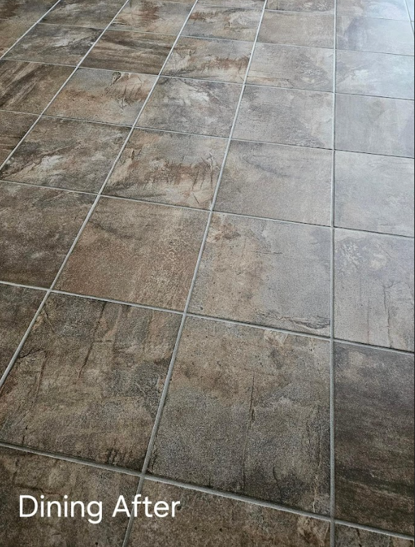 Professional Touch Carpet Upholstery Cleaning - A picture of a tiled floor in a dining room after being cleaned.