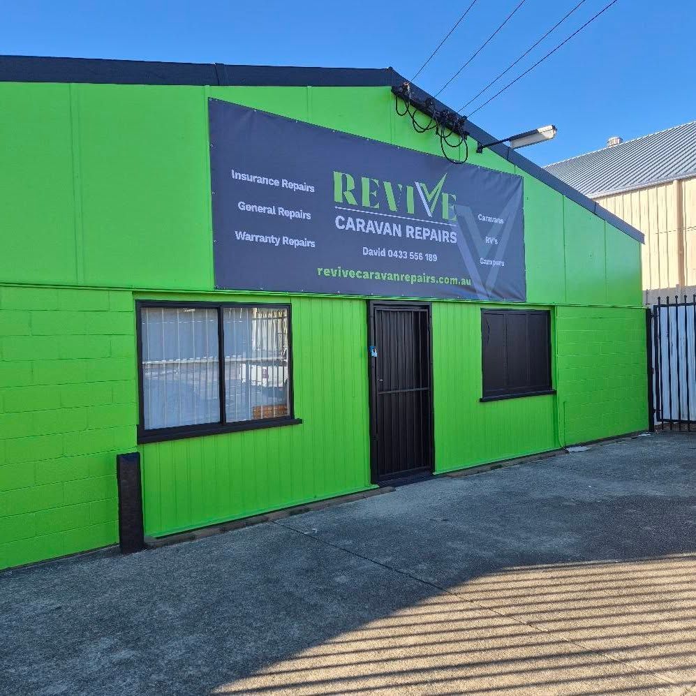 A Building with Revive Caravan & Repair Sign — Revive Caravan Repairs in Kippa-Ring, QLD