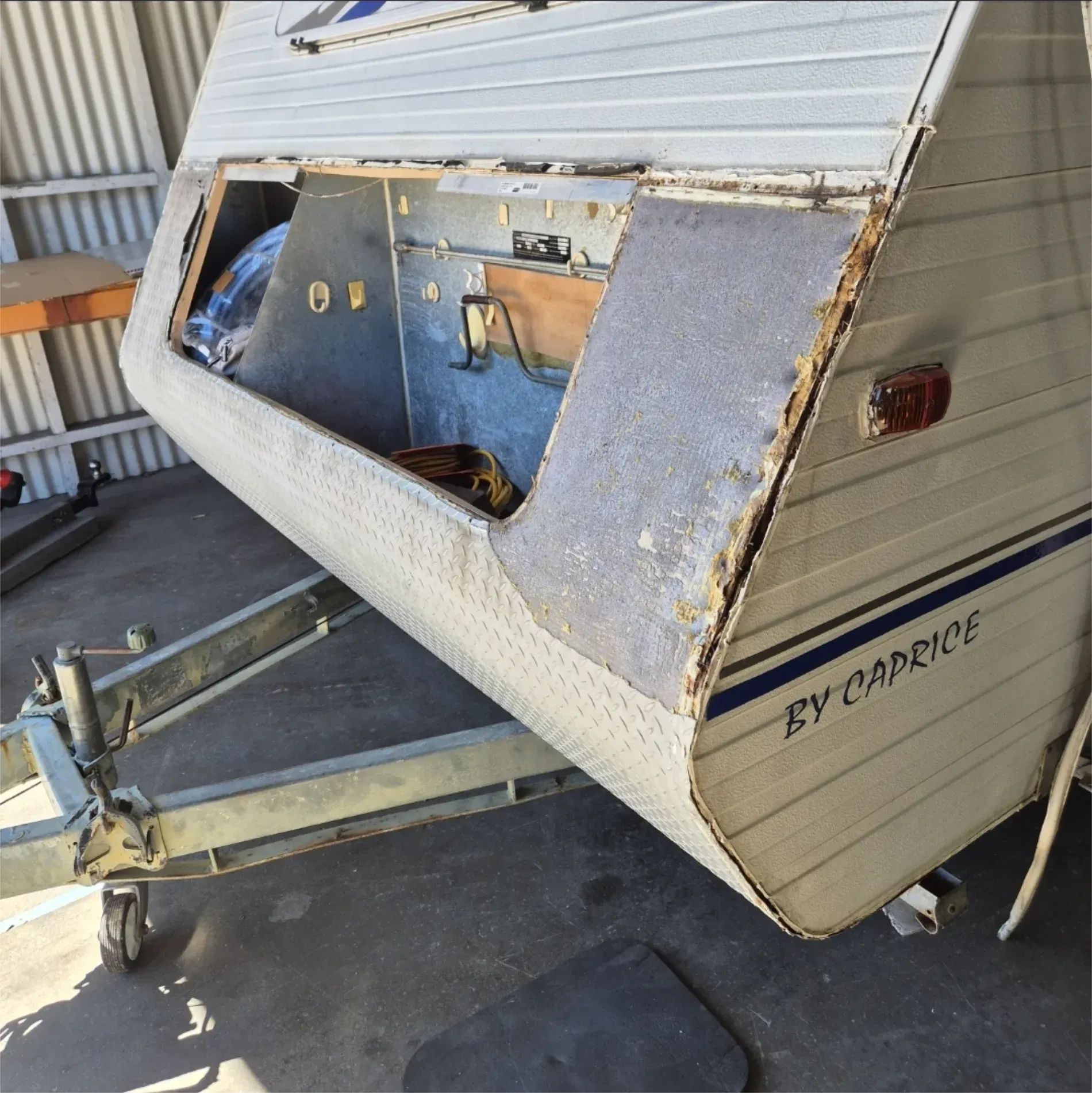 Jayco Eagle camper trailer in a weathered shed — Revive Caravan Repairs in Kippa-Ring, QLD