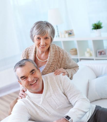 A Man and a Woman Standing Behind Him — Hyde Burchell Buyers Agents In Canberra, ACT