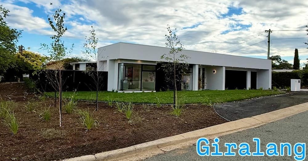 Modern, Flat-roofed White House With Large Windows
