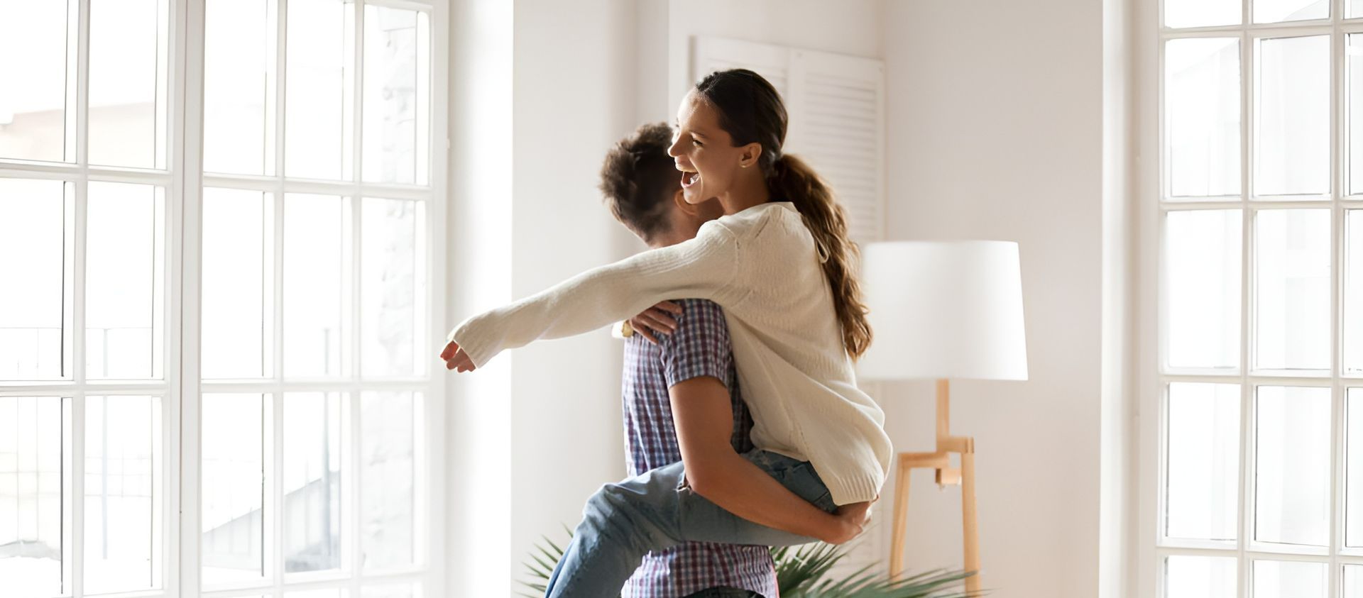 A Picture of a man carrying a woman — Hyde Burchell Buyers Agents In Canberra, ACT