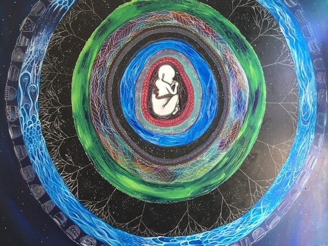Painting where at the centre there is a child in utero encircled by rings of colour and images linking rings in a tree trunk.