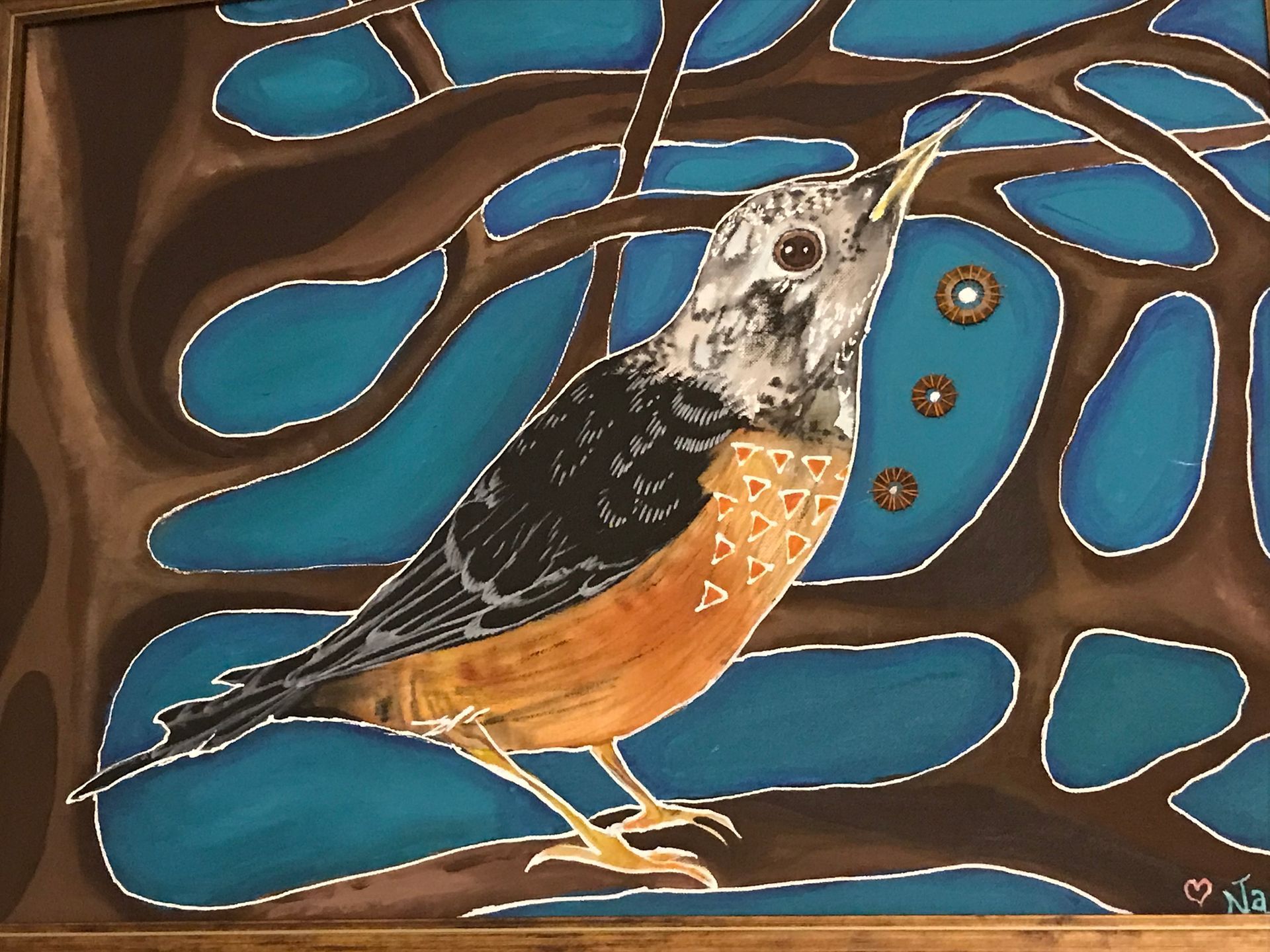 Painting of a bird, a robin amidst brown tree branches with a blue background.