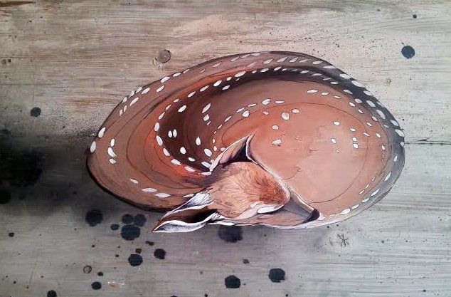Painting of a sleeping deer on a piece of wood pre splattered with paint by whoever had discarded it before I discovered it.