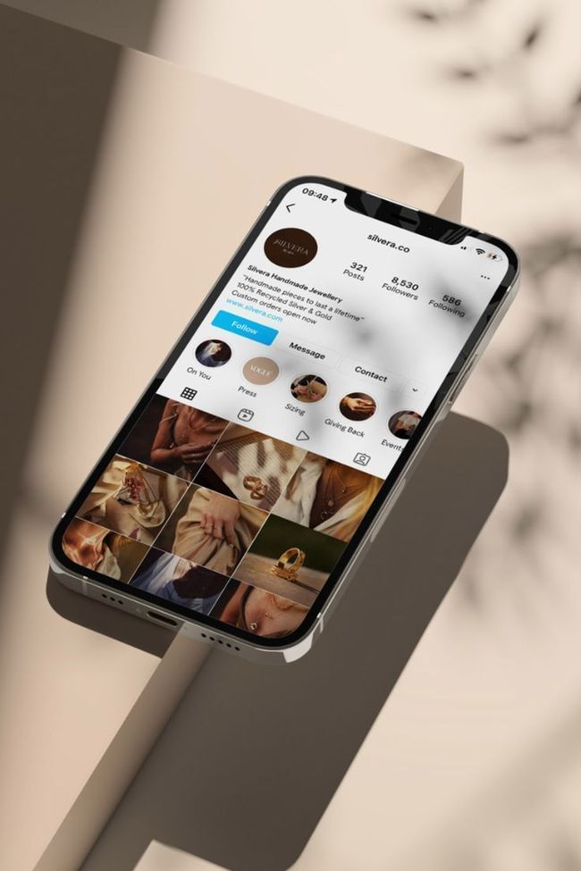 A cell phone is sitting on top of a table.