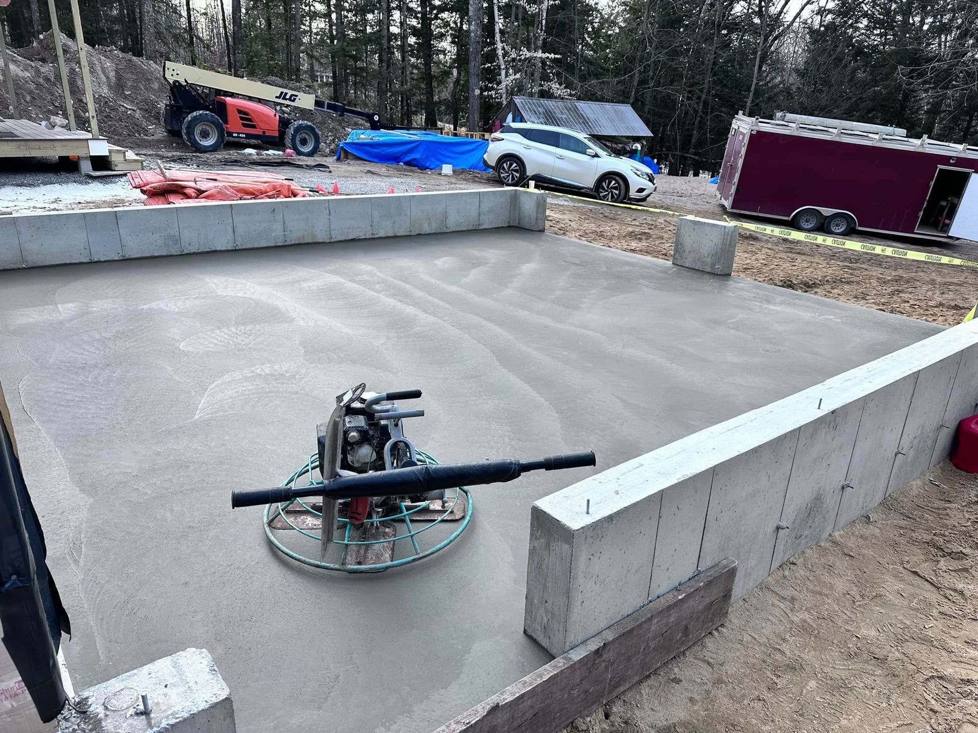 A machine is sitting on top of a concrete surface.