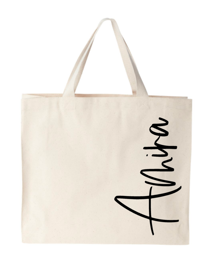 A white tote bag with the name anita on it