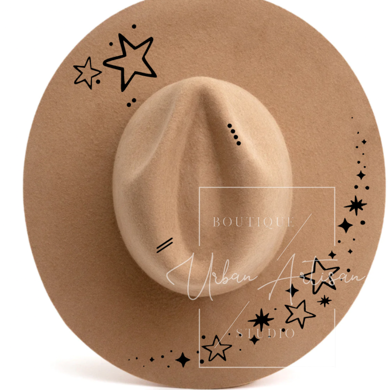 A brown hat with black stars and the word boutique on it