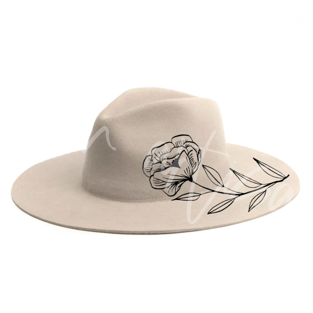 A white hat with a black rose on it