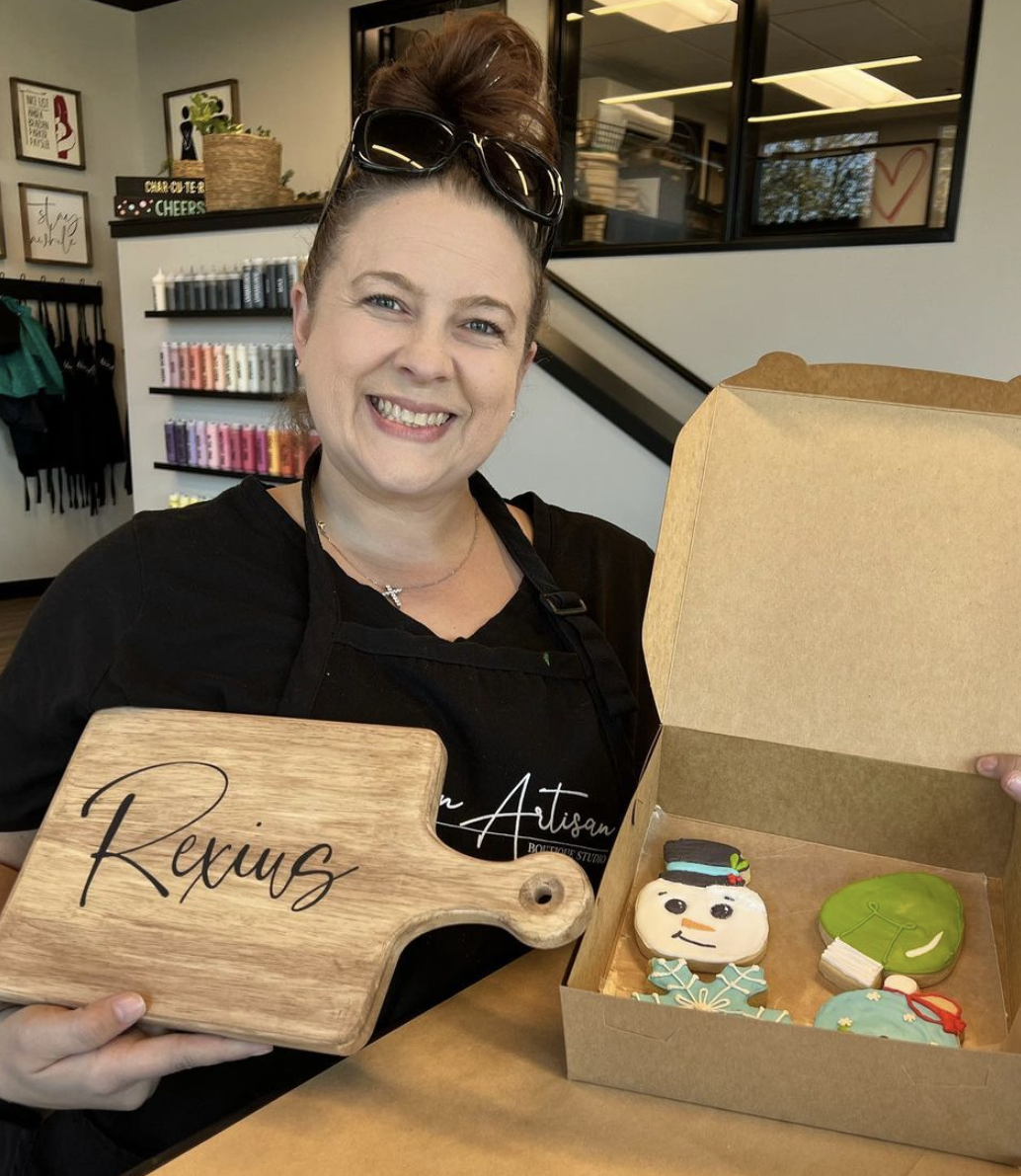  wooden cutting board with a name on it