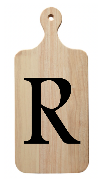 A wooden cutting board with the letter r on it