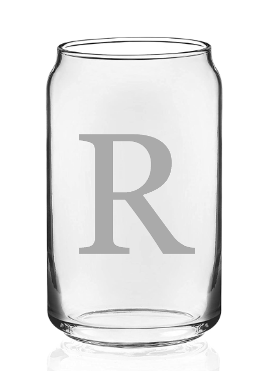 A clear glass can with the letter r on it.