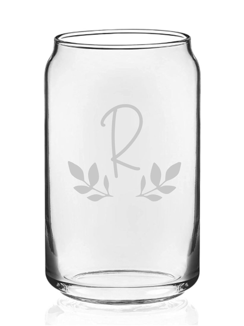 A clear glass can with the letter r etched on it