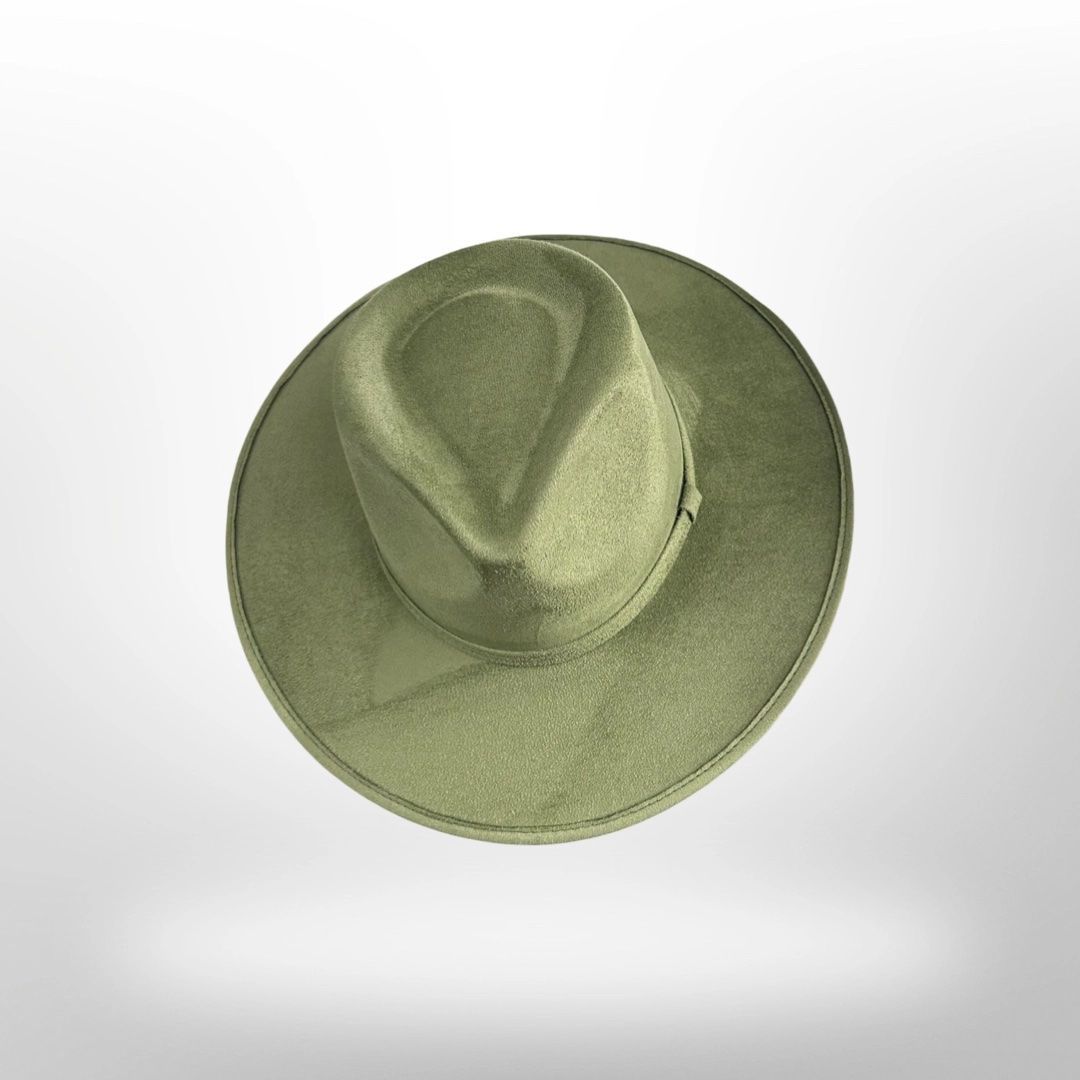 A green fedora hat is sitting on a white surface.