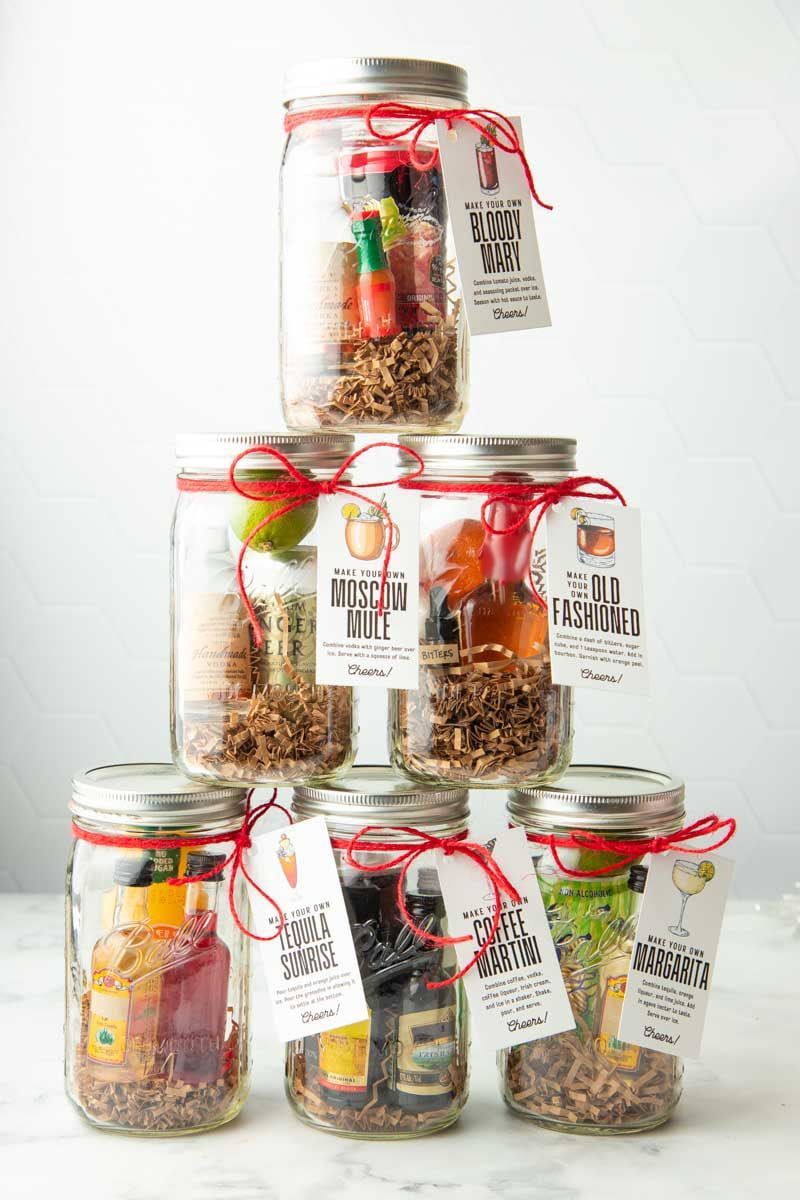 A stack of mason jars filled with food and drinks.