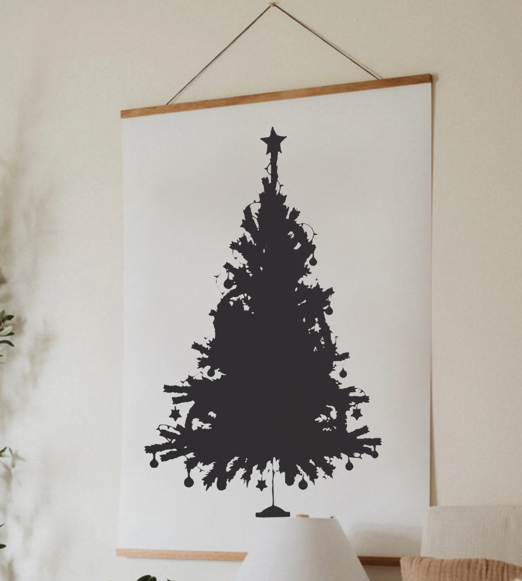 A black and white picture of a christmas tree with a star on top